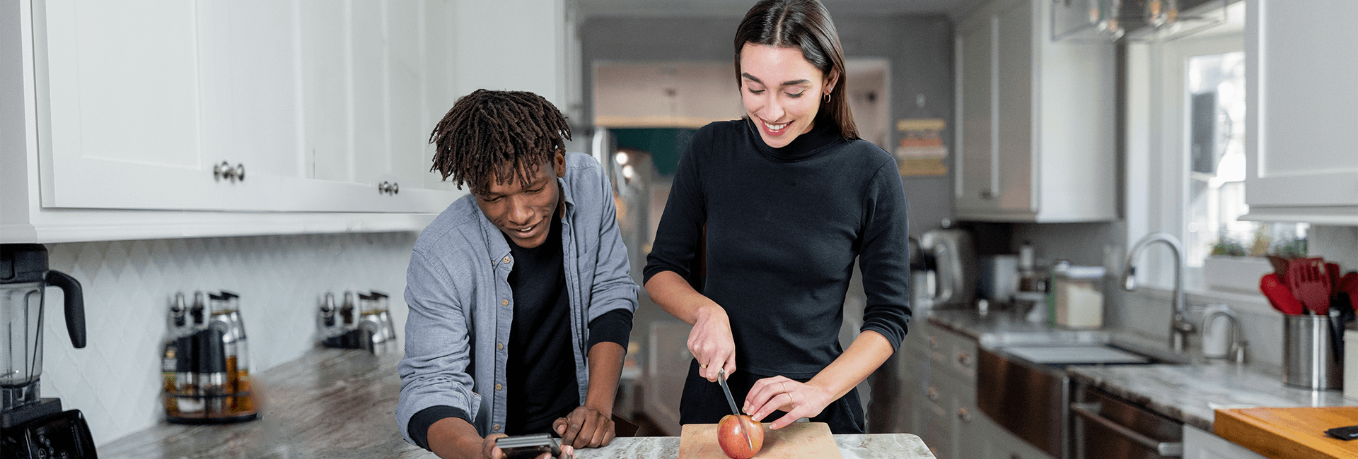 Man and woman at a kitchen counter