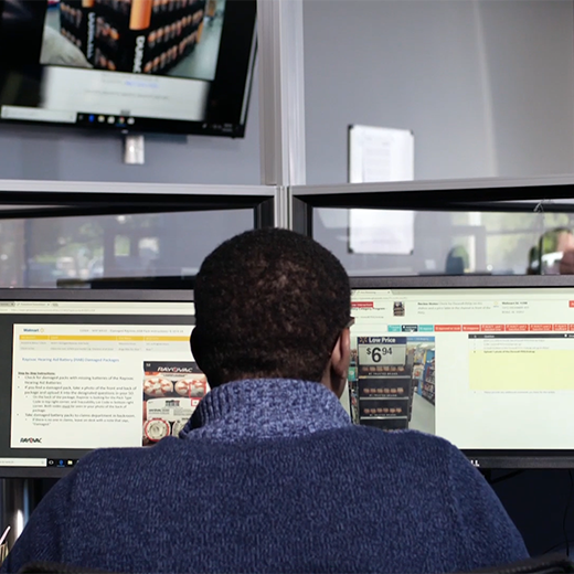 Man watching computer screens