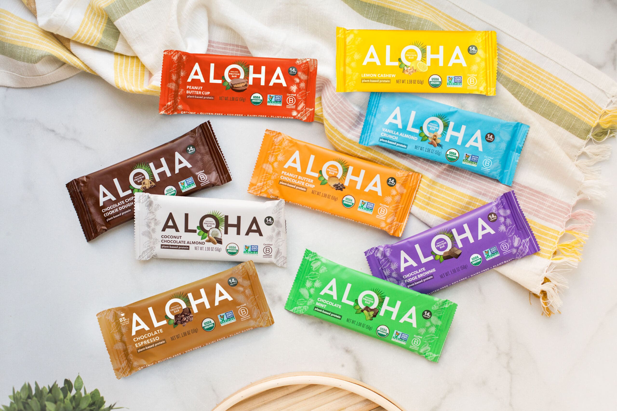 A collection of ALOHA's plant-based protein bars
